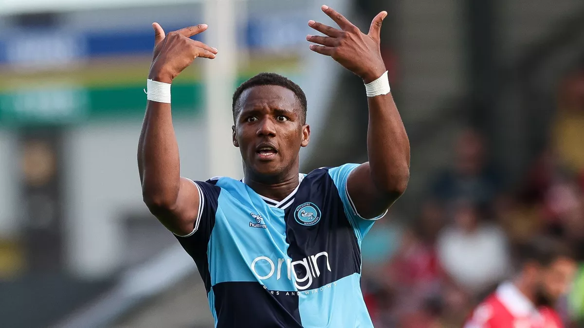 Wycombe thrash Stockport to surge to top of League One