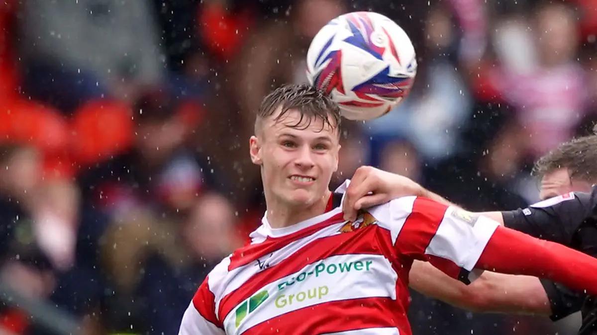 Doncaster secures League Two title with Rob Street scoring twice against Notts County