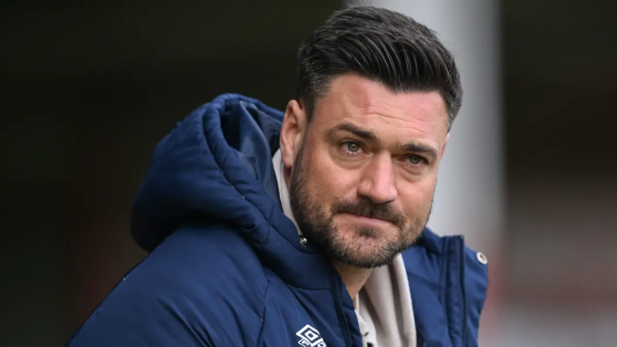 AFC Wimbledon Clinch Play-off Berth with Victory Over Grimsby